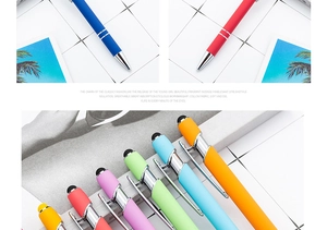 Close-up of colorful retractable stylus pens with metal clips in various vibrant colors