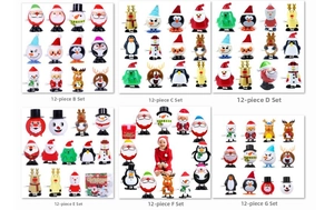 Detail view of 12-piece Christmas wind-up toy set featuring Santa, penguin and reindeer