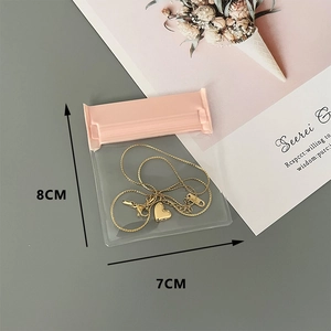 Detailed view of heart pendant necklace in an 8x7cm EVA anti-oxidation sealed bag
