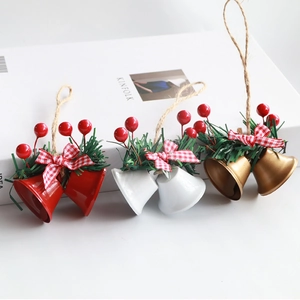 Christmas bell pendants with red berries and pine needles in red white and gold