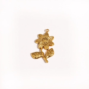 Detailed view of a golden stainless steel flower pendant with polished leaves and petals