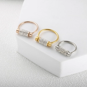 Three-piece sparkling nose rings in rose gold, gold, and silver with inlaid clear zircons