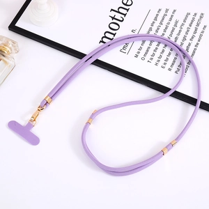Dettaglio del cordino viola intrecciato con chiusura dorata e inserto a T su decoro