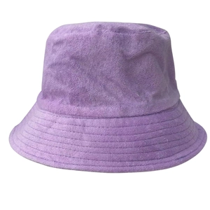 Detailed close-up showing the purple terry cloth texture of this cozy bucket hat style