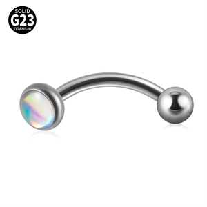 Detailed macro view of solid G23 titanium curved barbell with colorful opal bead top