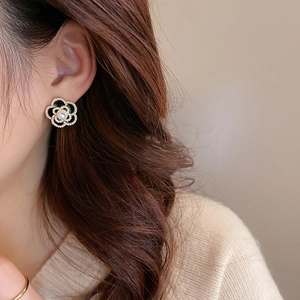 Vintage camellia flower earrings with faux pearl and black enamel in gold setting