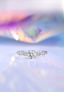 Macro detail of S925 silver ring with 0.5ct moissanite diamond and wavy stone setting