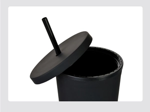 Detail view of the matte black 16oz tumbler with lid and reusable straw mechanism