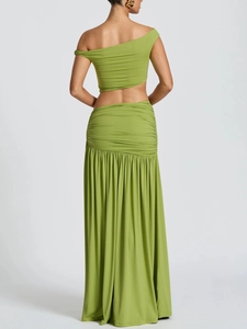 Rear view of avocado green two-piece set with ruched waist and long flowing maxi skirt