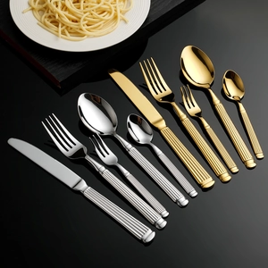 Golden and silver 8-piece stainless steel cutlery set with Roman column texture handles