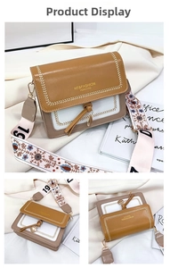 Close-up of contrast crossbody bag with floral strap and beige stitching details