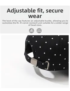 Detailed close-up of adjustable metal buckle on vintage polka dot washed cotton baseball cap