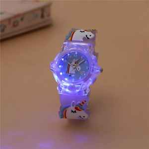Glow-in-the-dark detail of purple unicorn kids watch with blue LED light-up effect