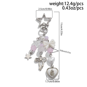 Detailed view of bead keychain with cat photo pendant and size measurements in inches
