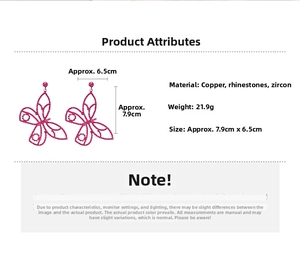 Detailed view of oversized pink butterfly earrings featuring zircons and copper alloy