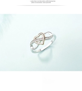 Macro detail of S925 sterling silver heart and infinity ring with inlaid zircon stones