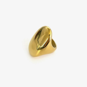 Polished gold stainless steel oval ring with chunky irregular geometric design
