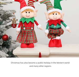 Detailed close-up of plush Christmas elf dolls in red and green plaid outfits