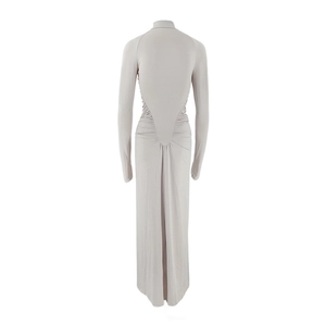 Detail of greyish-beige long sleeve maxi dress featuring back ruching and slim fit cut