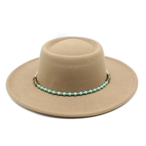 Detailed view of camel wool fedora hat with turquoise and golden beaded strap embellishment