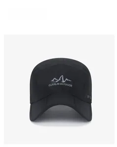 Detail of black quick-dry hat featuring UPF 50+ sun protection and outdoor logo