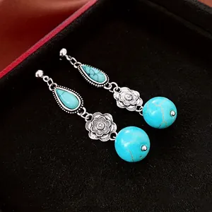 Vintage silver flower earrings with turquoise drop stones and ethnic bohemian charms