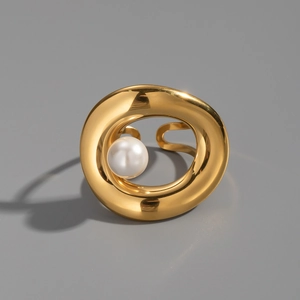 Detailed view of irregular 18K gold plated ring featuring a lustrous white pearl accent