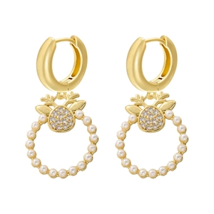 Macro view of elk reindeer drop earrings with golden antlers and pearl wreath detail