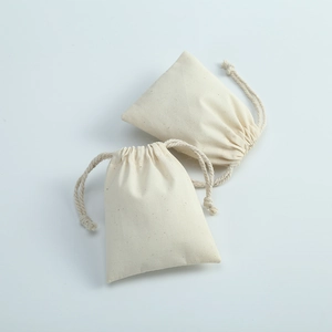 Detailed view of natural cotton linen drawstring pouch with dual rope closure