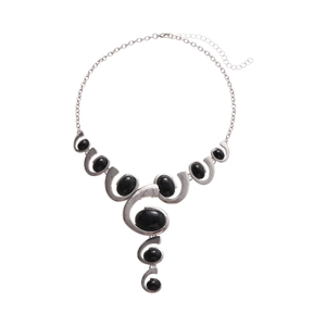 Vintage irregular oval pendant necklace with silver spiral design and black stone