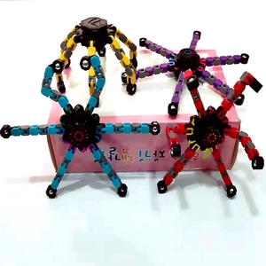 Mechanical fidget spinner toys in blue yellow red and purple with flexible chains