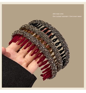 Detail of three rhinestone headbands in burgundy, black and gold with comb teeth