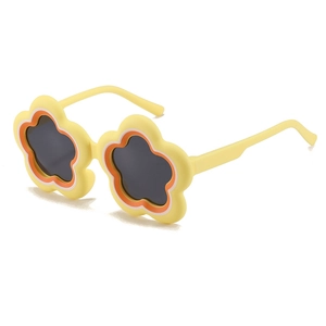 Yellow flower shaped kids sunglasses with orange accents and dark grey lenses for sun safety