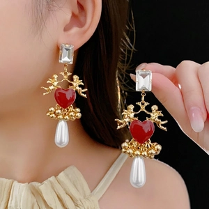 Vintage gold angel earrings with red enamel heart and teardrop pearl charms