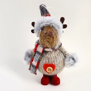 Detail of Christmas reindeer plush ornament with gray knit body and red heart decoration