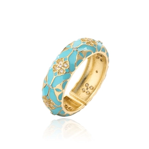 Close-up of 18K gold plated ring featuring turquoise enamel flowers and zircon stones