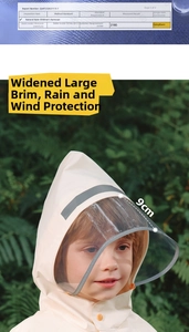 Close-up of cream kids raincoat featuring a 9cm wide transparent waterproof brim
