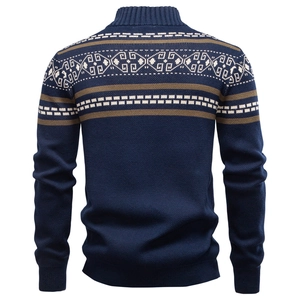 Detail of navy knit sweater showing geometric jacquard pattern on back and collar