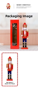 Detailed view of 36cm wooden nutcracker king with crown and scepter in its red gift box