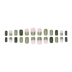 Olive green press-on nails set with pearls and star designs for a luxury chic look