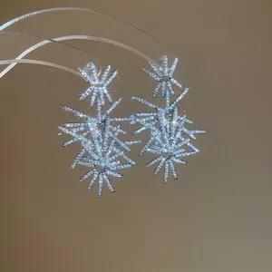 Sparkling silver firework starburst drop earrings with cubic zirconia stones and pavé finish