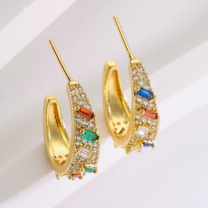 Elegant gold hoop earrings with multi-colored gemstones for women on white background