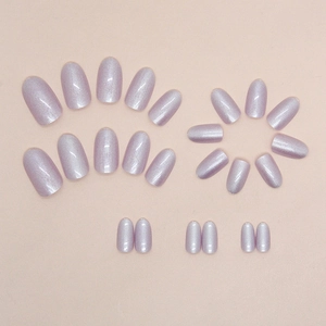 Set of lilac oval press-on nails with aurora glitter finish for a stylish look