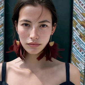 Boho chic red feather tassel earrings with gold hooks for a vintage ethnic accessory look