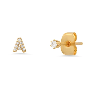 Detail of gold initial A stud earring with cubic zirconia accents on white background