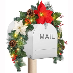 Lighted Christmas mailbox swag with red flowers, pine cones and warm LED lights