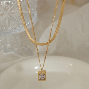 Double-layered gold titanium necklace with snake chain and square zircon pendant