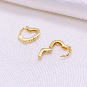 Elegant S925 sterling silver heart-shaped hoop earrings in a polished gold finish