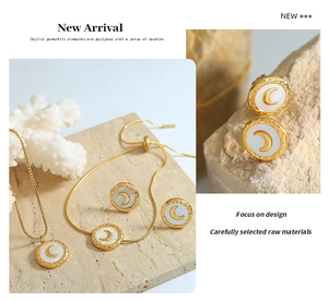 Detail of moon jewelry set with white shell inlay on natural stone background