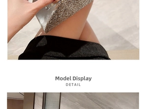 Detailed macro view of silver glitter texture on the luxury evening clutch bag surface